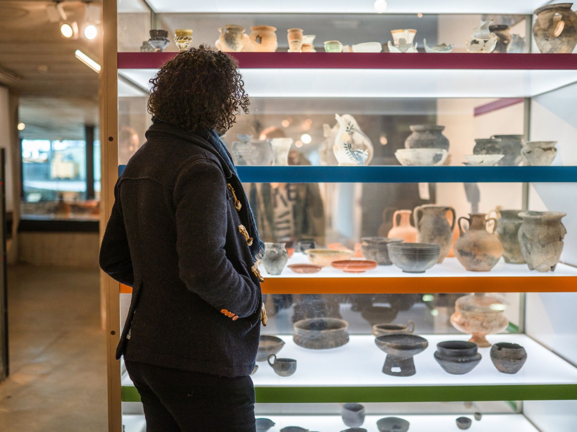 A person looks at a museum display.