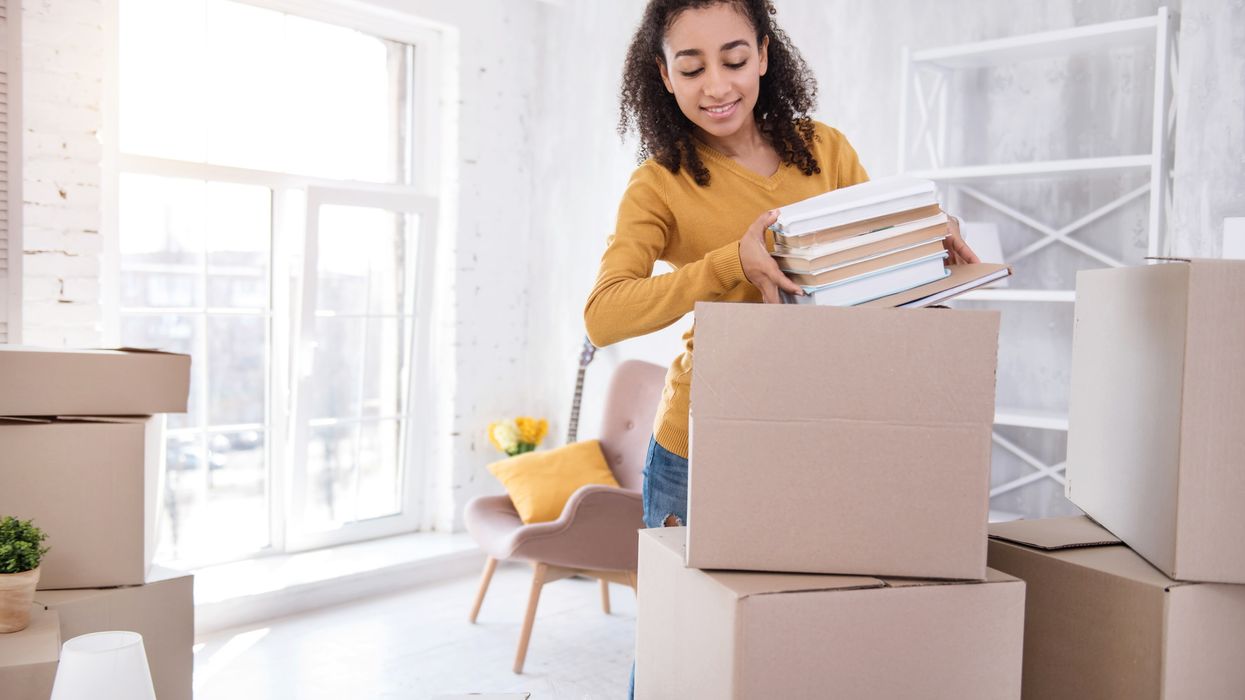 College student loading boxes