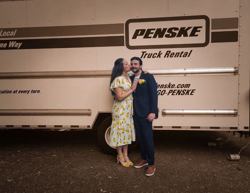 couple married in front of penske truck rental