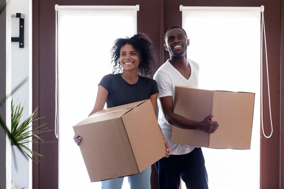 Couple Moving Boxes