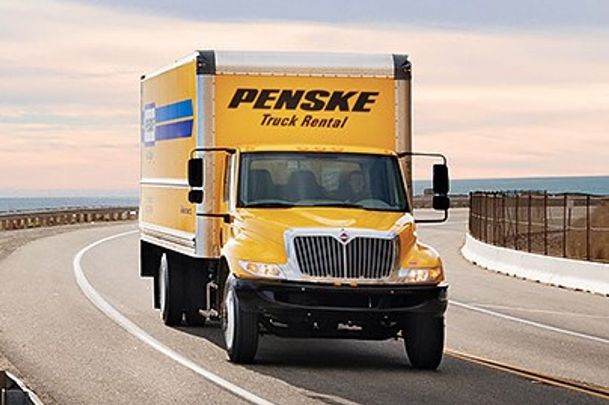 Penske 22 to 26 foot box truck (CDL required) on a highway overlooking the ocean
