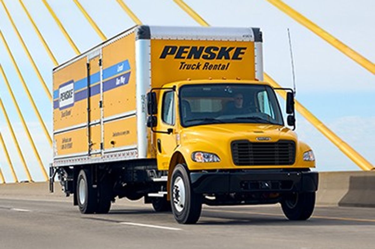 Penske box truck crossing a suspension bridge