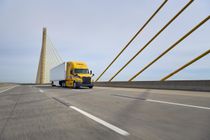 https://www.pensketruckrental.com/media-library/penske-heavy-duty-truck-driving-over-bridge.jpg?id=31291376&width=210