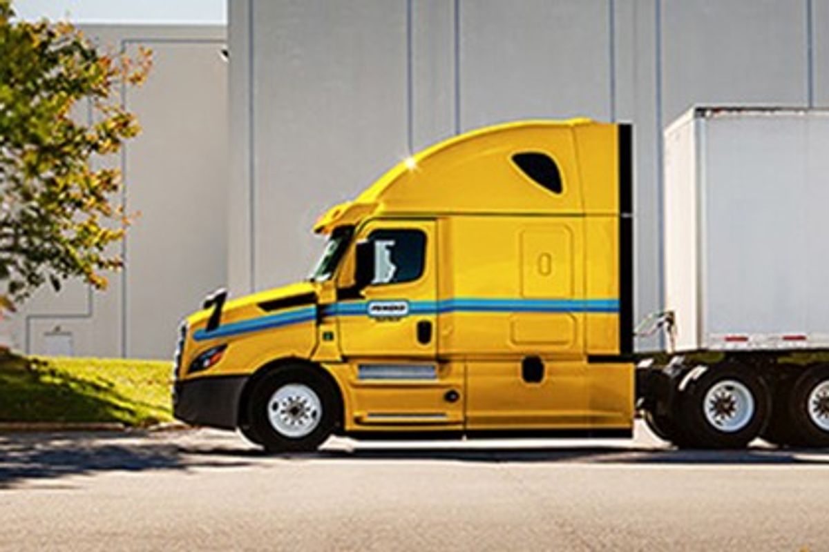 Penske tractor trailer at a loading dock