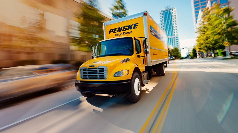 Penske truck on street in city