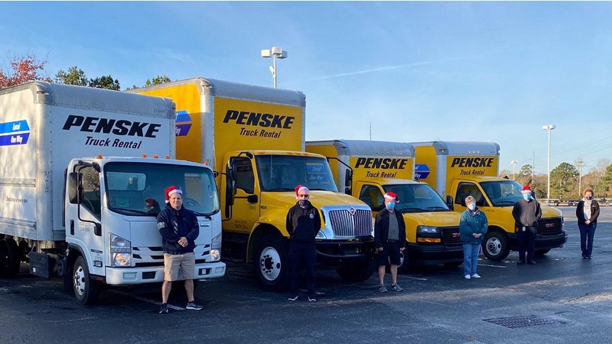 Penske trucks with Santa's helpers