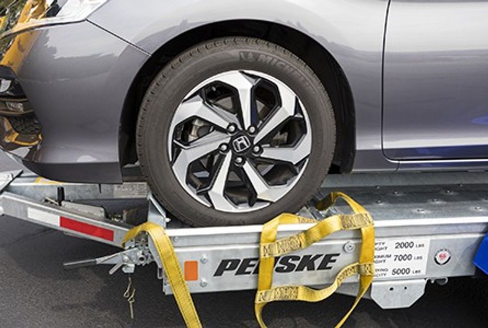User connecting a car carrier