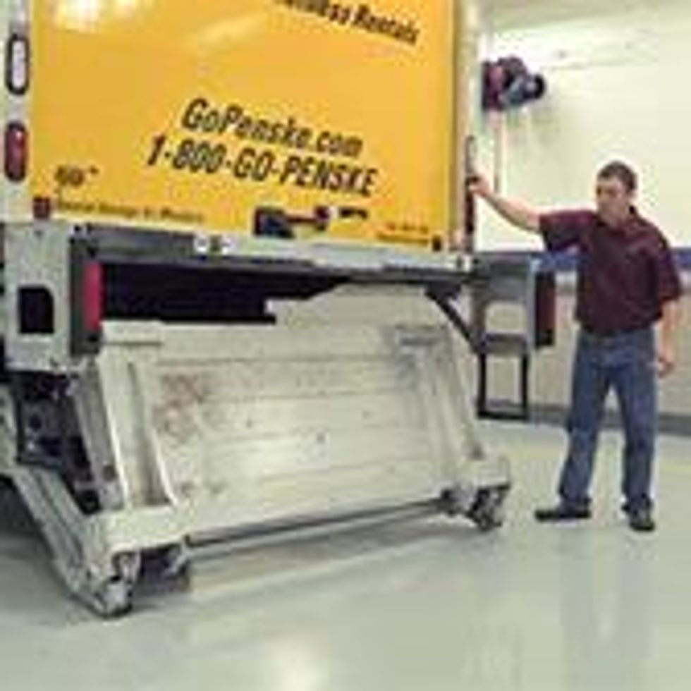 User stowing the liftgate
